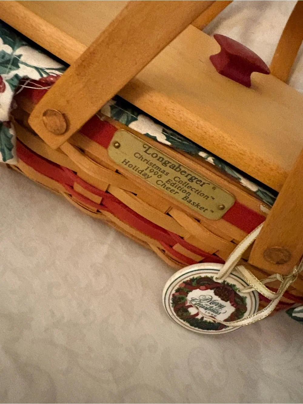 Longaberger Holiday Cheer Woven Basket with Holly liner.